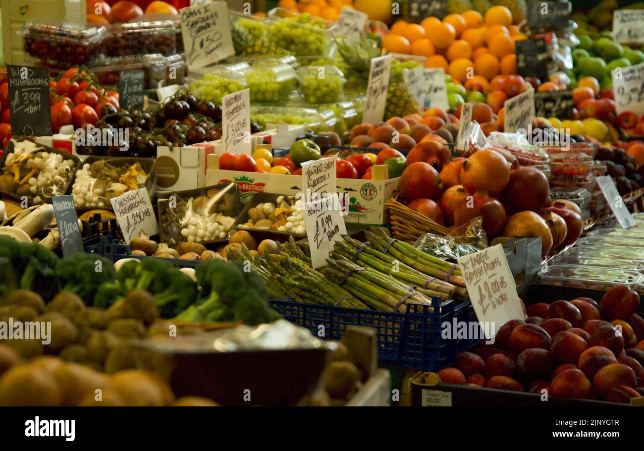 Fresh fruit and vegetables for sale in grocery stall, UK Stock Photo