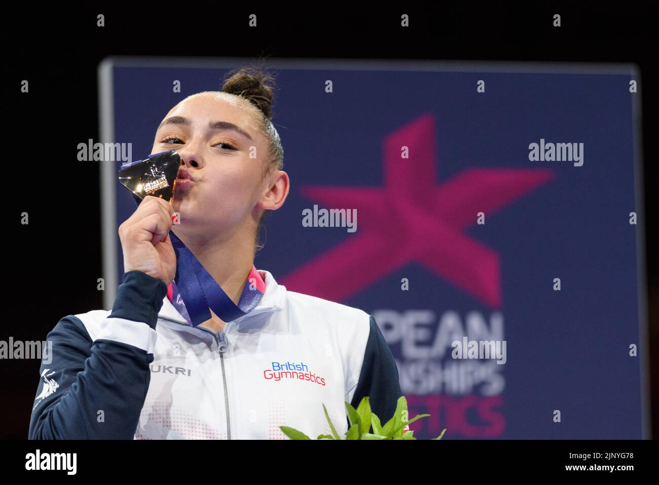 Great Britain's Jessica Gadirova celebrates with the gold medal after