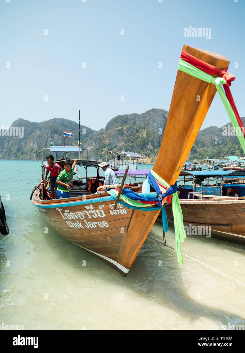 TON SAI BEACH, KRABI , THAILAND. 28 March 2016. Traditional excursion boats on Ton Sai Beach. Stock Photo