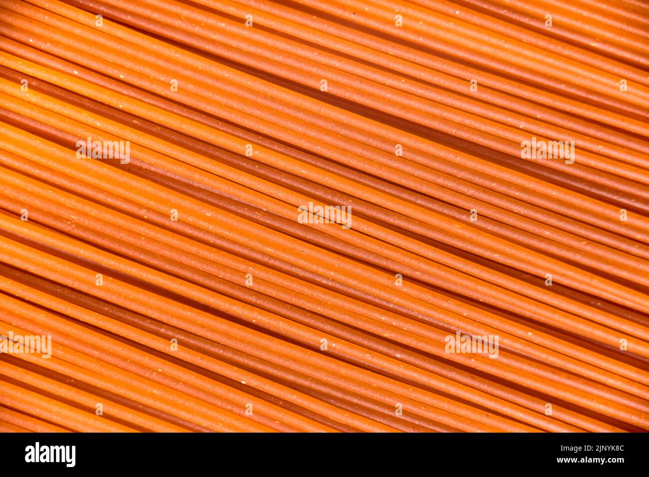 Italian healthy food background, raw sweet bell pepper spaghetti