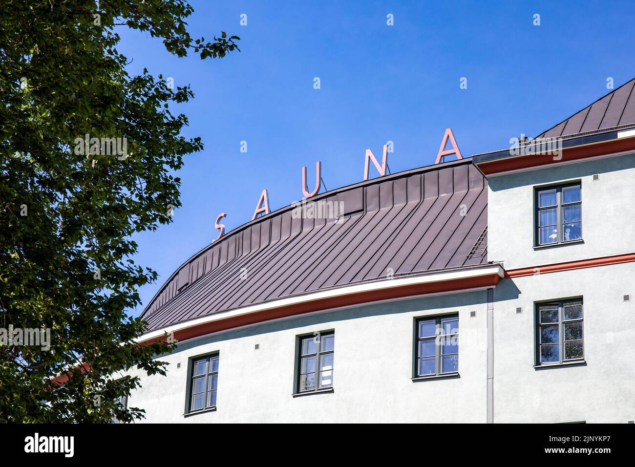 Sauna letters on the roof of a residential building in Kallio district of Helsinki, Finland Stock Photo
