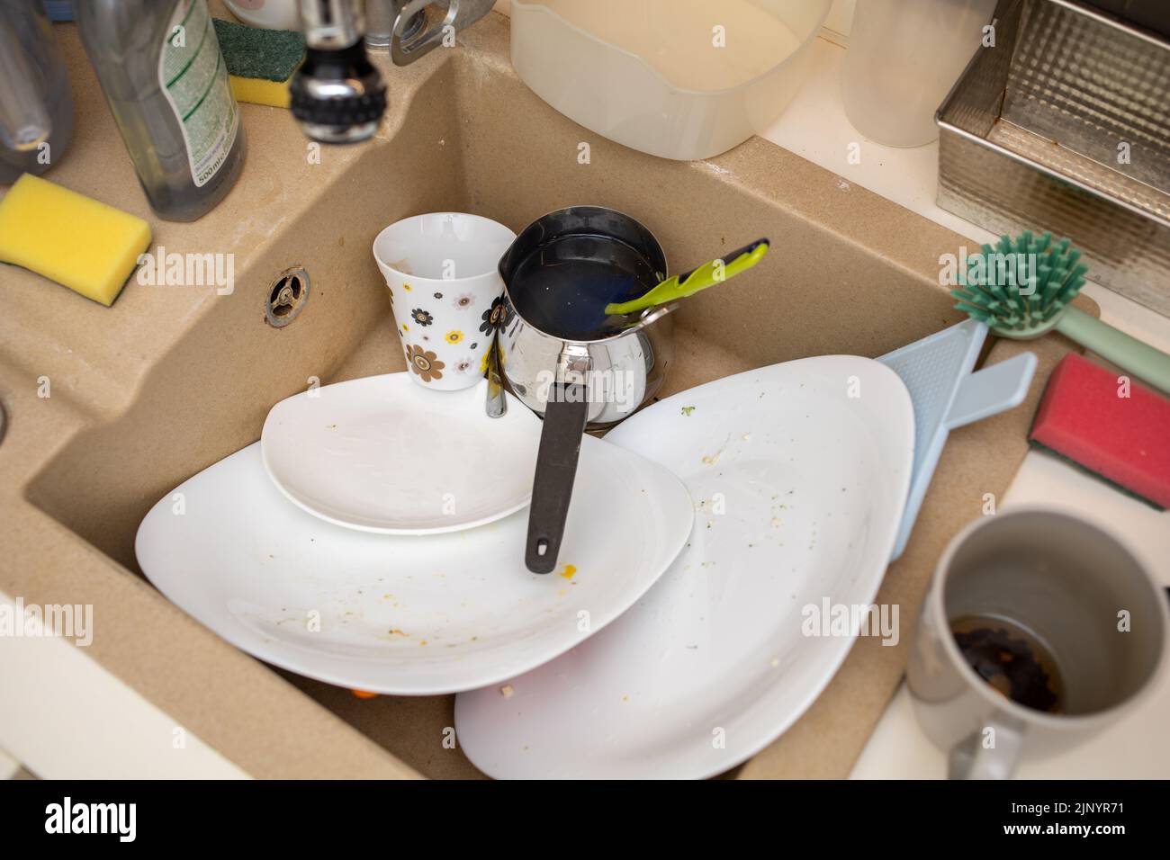 sink with dirty dishes cups and tableware Stock Photo Alamy