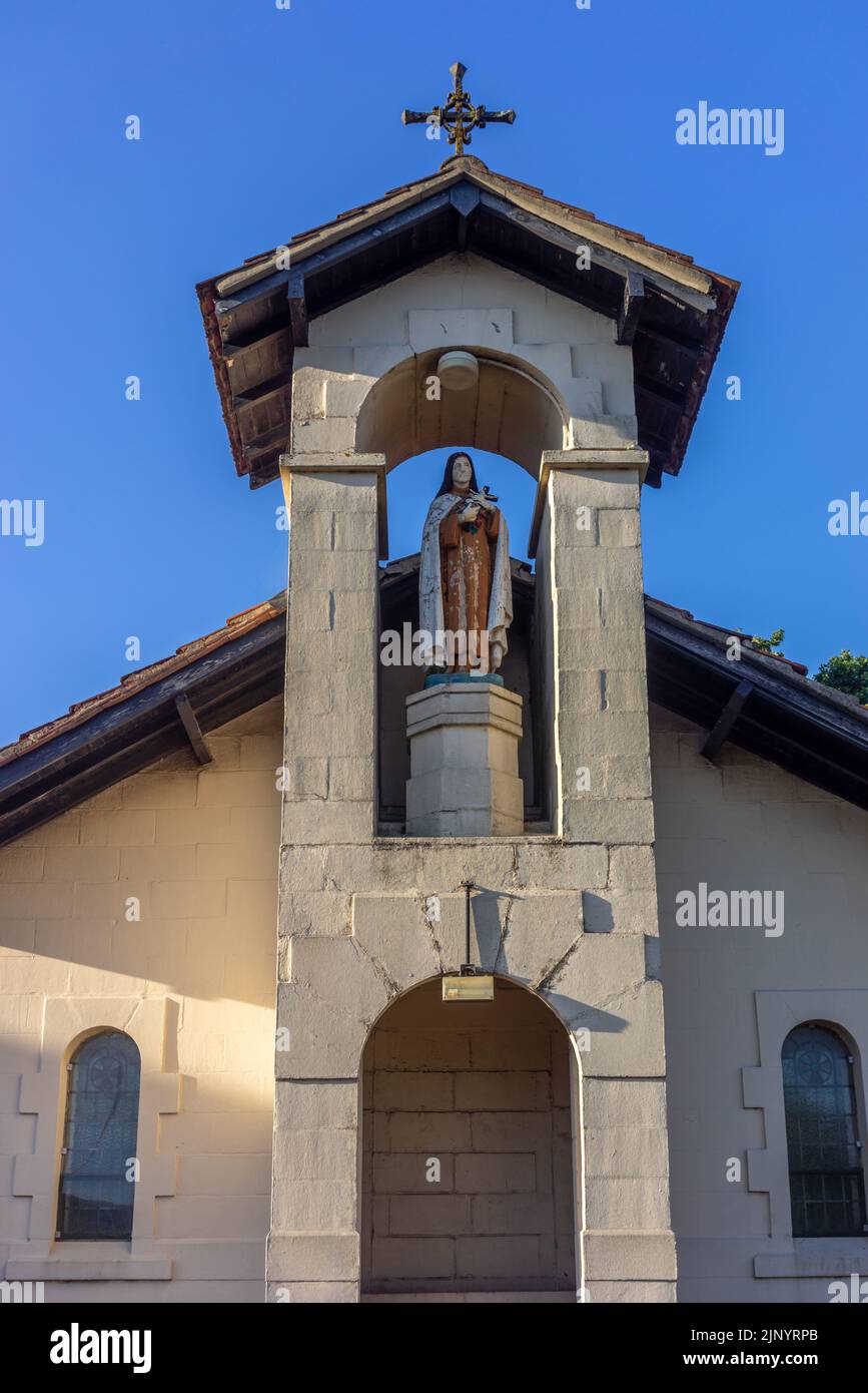 St Theresa Catholic church in Totton with open gabled turret containing a statue of St Theresa, Southampton, Hampshire, England, UK Stock Photo