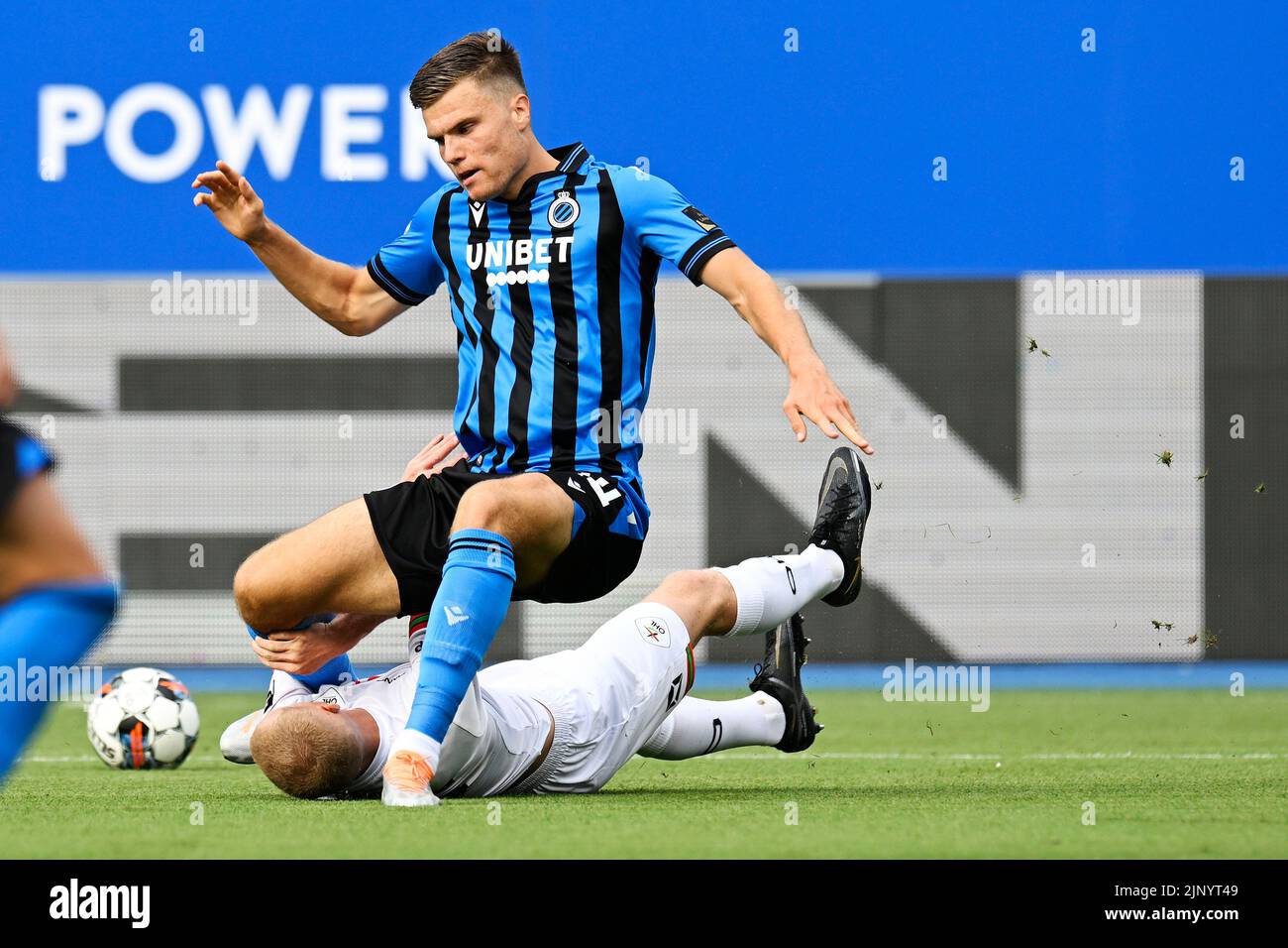 Club's Bjorn Meijer and OHL's Casper De Norre fight for the ball during
