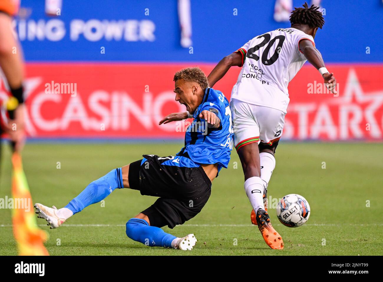 Club's Noa Lang and OHL's Hamza Mendyl fight for the ball during a