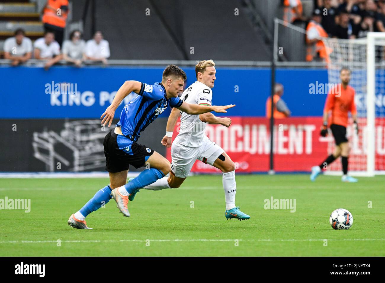 Club's Bjorn Meijer and OHL's Joren Dom fight for the ball during a