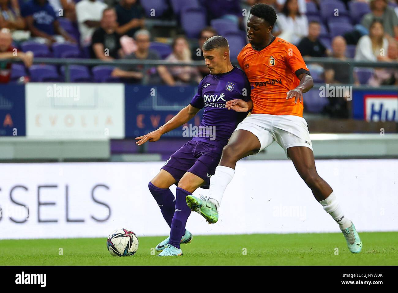 RSCA Futures' Mohamed Bouchouari and Deinze's Bafode Dansoko fight for the  ball during a soccer match between RSC Anderlecht Futures and KMSK Deinze,  Sunday 14 August 2022 in Anderlecht, on day 1