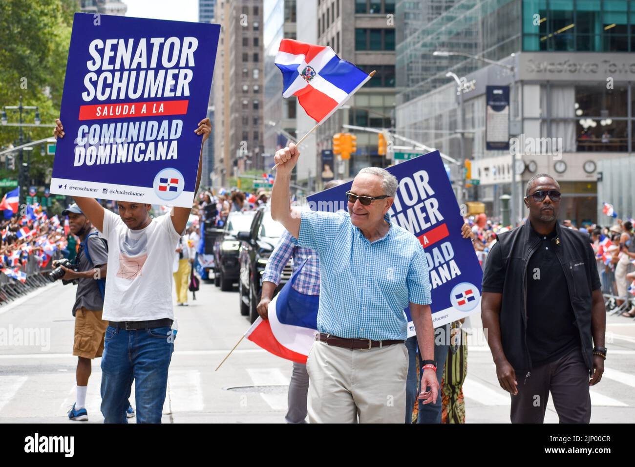 Senator Chuck Schumer (D) is marching along Sixth Avenue during the annual Dominican Day parade on August 14, 2022 in New York City. Stock Photo