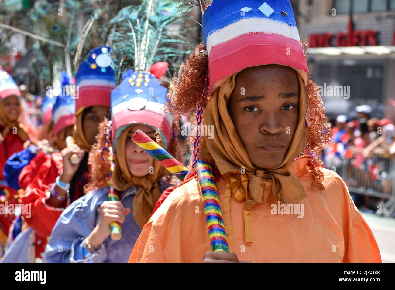 Performers march along Sixth Avenue during the annual Dominican Day parade on August 14, 2022 in New York City. Stock Photo