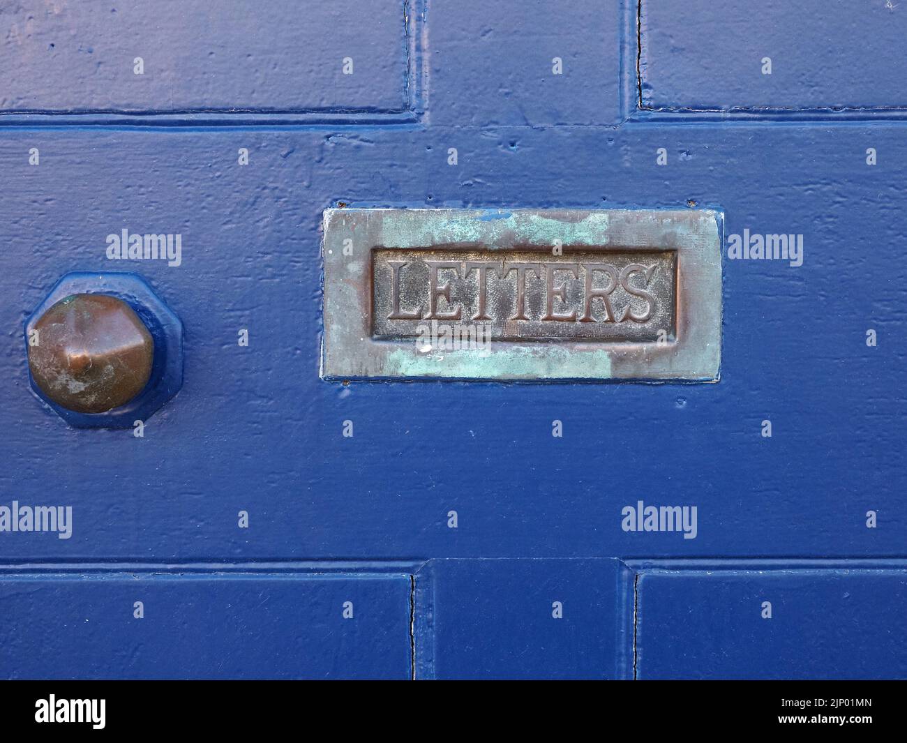 antique letterbox with oxidised verdigris and lettering LETTERS set in