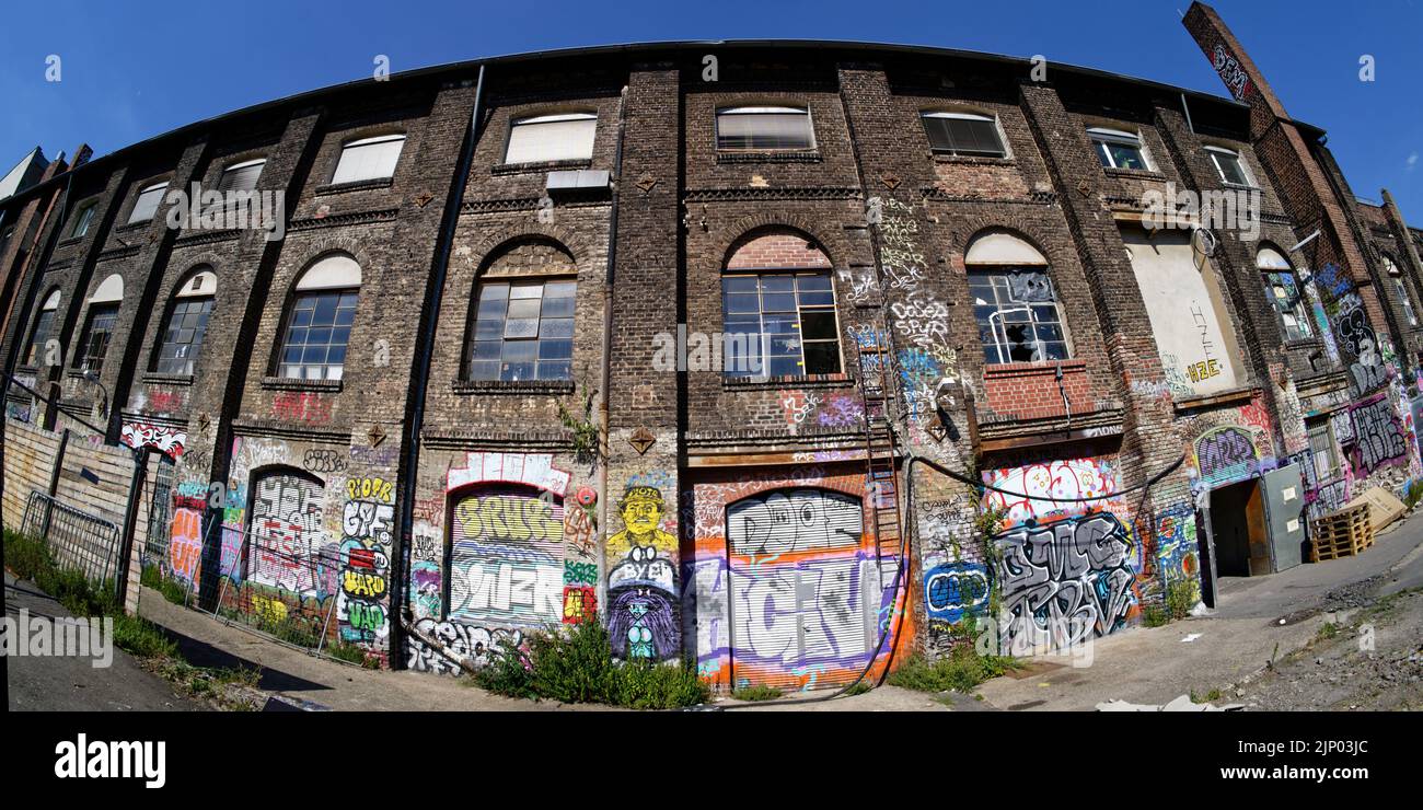 Cologne, Germany, August 10, 2022: many graffities on the backside of the helios rheinlandhalle in cologne ehrenfeld Stock Photo