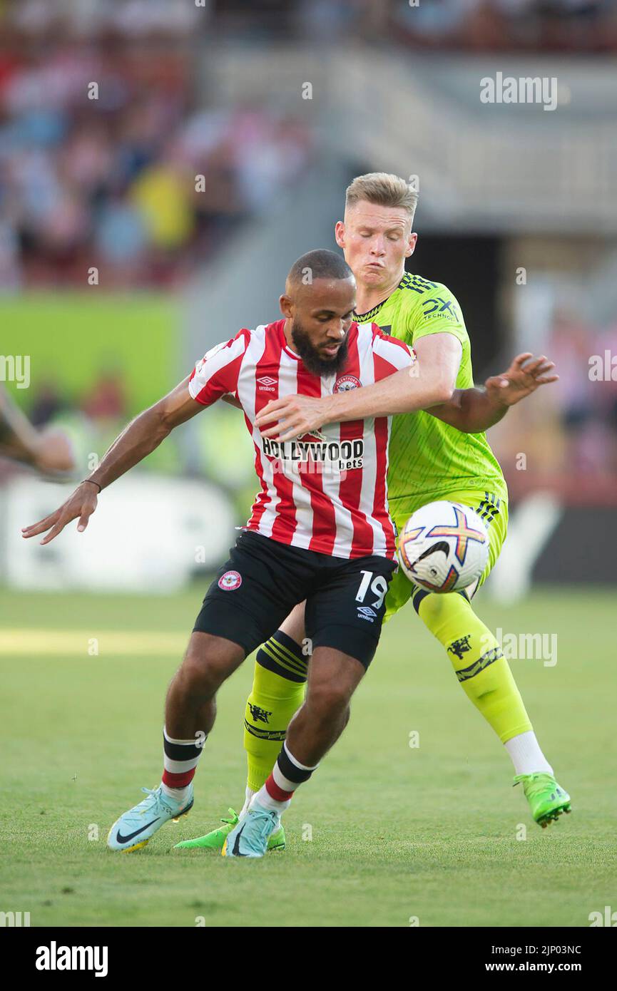 Scott McTominay of Manchester United challenges the ball with Bryan Mbeumo  of Brentford during the Premier League match between Brentford and  Manchester United at Gtech Community Stadium, London, POLAND AND ENGLAND on