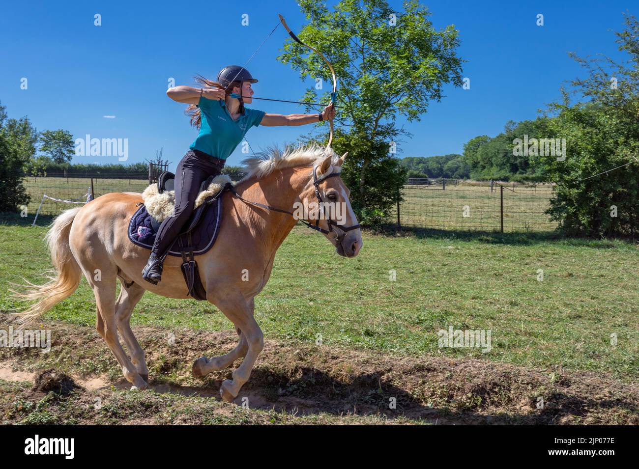 Europe, Luxembourg, Limpach, Equine Archery Event July 2022 with a Female Competitor in the Professional Group Stock Photo