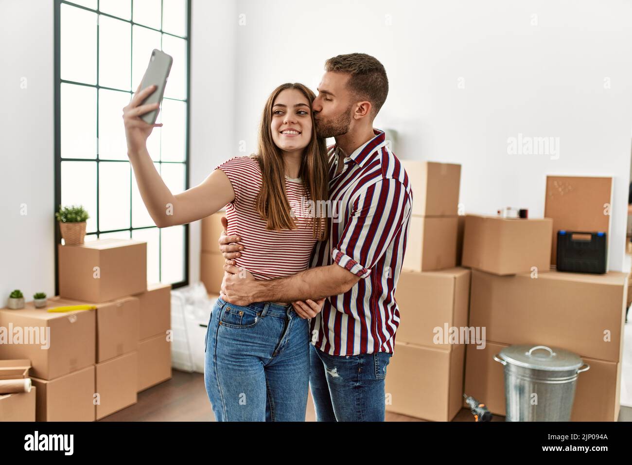 Young caucasian couple smiling happy make selfie by the smartphone at ...