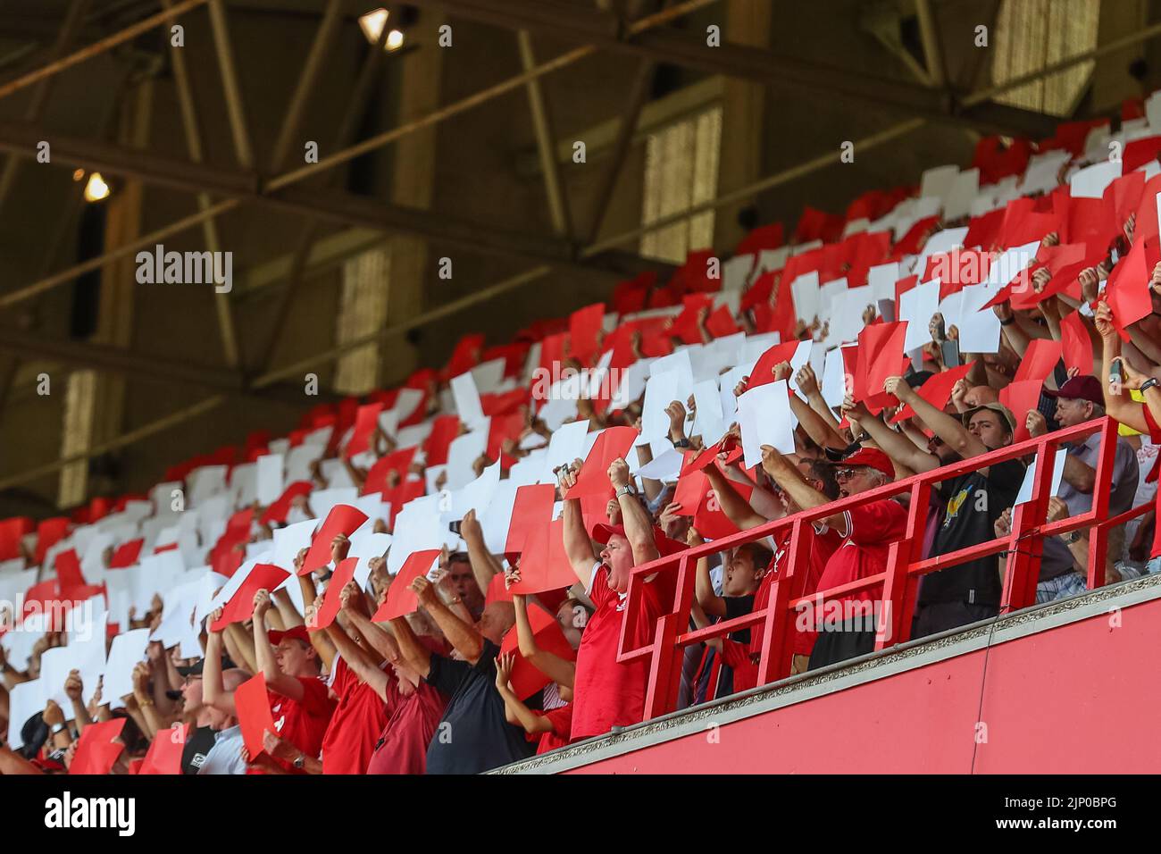Nottingham Forest hold up coloured paper to form a display ahead of kick off Stock Photo