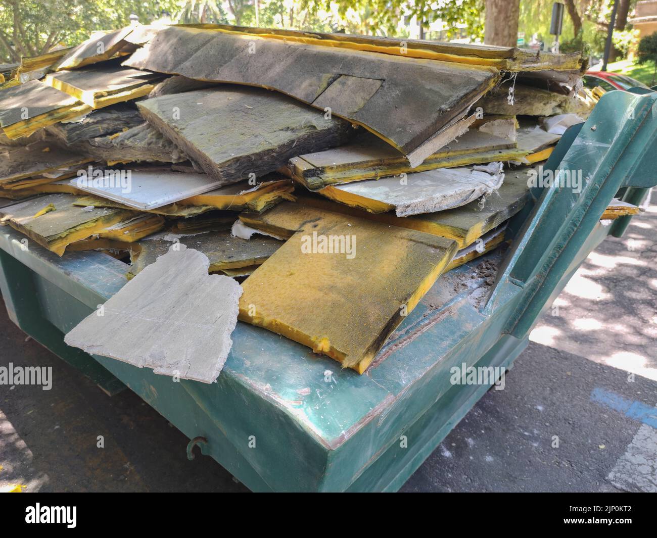 Container full of polyurethane sheets. Management of hazardous waste Stock Photo