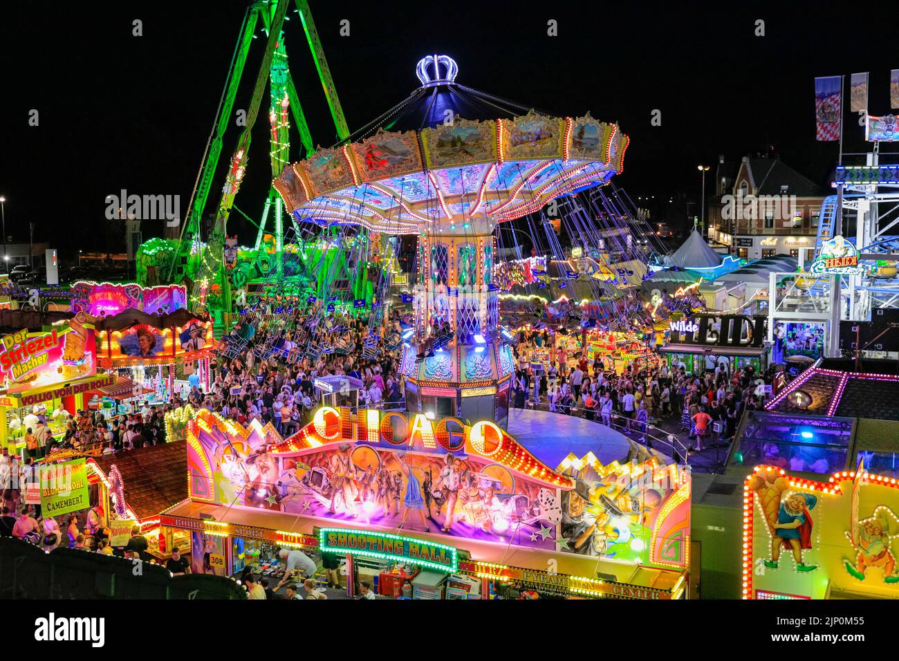 Herne, NRW, Germany. 14th Aug, 2022. Cranger Kirmes, Germany's 3rd largest funfair with a tradition dating back to the middle ages, has returned to pre-pandemic visitor numbers with more than 3.9m attending in hot, sunny weather, enjoying the rides, rollercoasters, beer halls, food and drink. The funfair concluded tonight with fireworks over the nearby Rhine-Herne Canal. Credit: Imageplotter/Alamy Live News Stock Photo