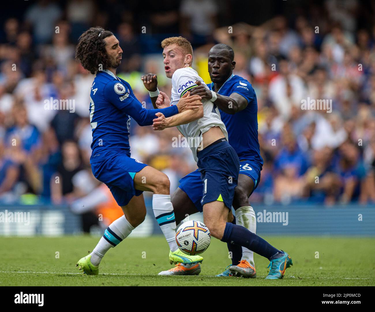 London, UK. 15th Aug, 2022. Chelsea's Marc Cucurella (L) and Kalidou Koulibaly (R) challenge Tottenham Hotspur's Dejan Kulusevski during the English Premier League match between Chelsea and Tottenham Hotspur in London, Britain, on Aug. 14, 2022. The game ended in a 2-2 draw. Credit: Xinhua/Alamy Live News Stock Photo