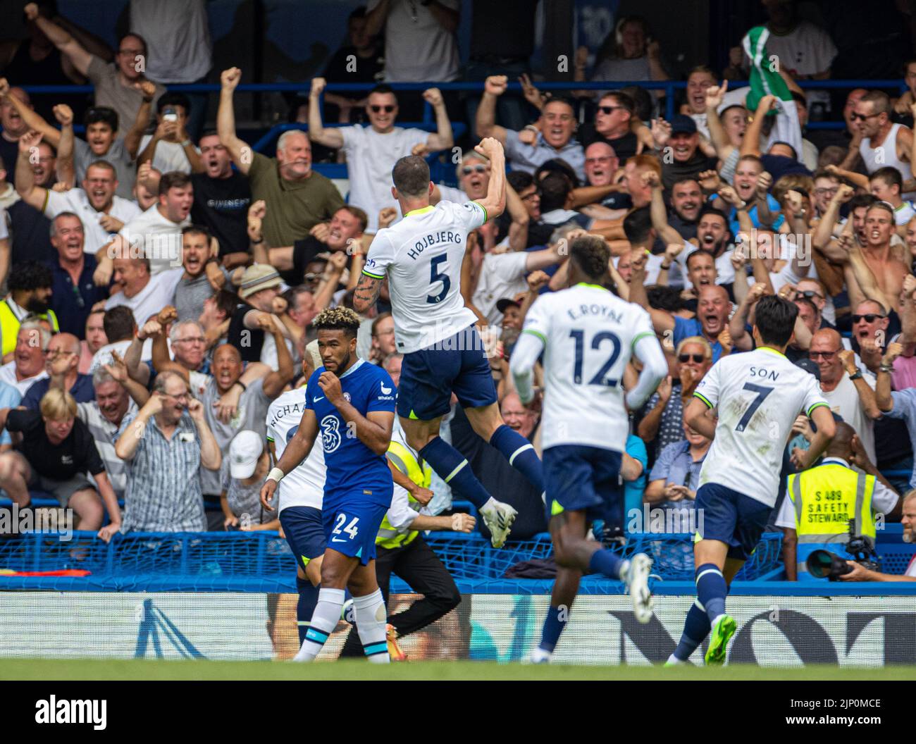 London, UK. 15th Aug, 2022. Tottenham Hotspur's Pierre-Emile Hojbjerg (up) celebrates after scoring during the English Premier League match between Chelsea and Tottenham Hotspur in London, Britain, on Aug. 14, 2022. The game ended in a 2-2 draw. Credit: Xinhua/Alamy Live News Stock Photo