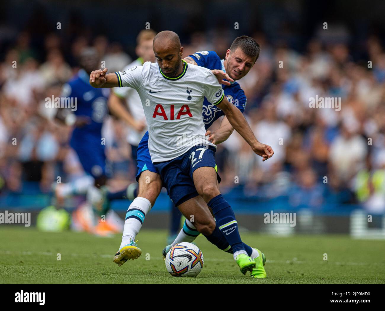 London, UK. 15th Aug, 2022. Tottenham Hotspur's Lucas Moura (L) is tackled by Chelsea's Mason Mount during the English Premier League match between Chelsea and Tottenham Hotspur in London, Britain, on Aug. 14, 2022. The game ended in a 2-2 draw. Credit: Xinhua/Alamy Live News Stock Photo