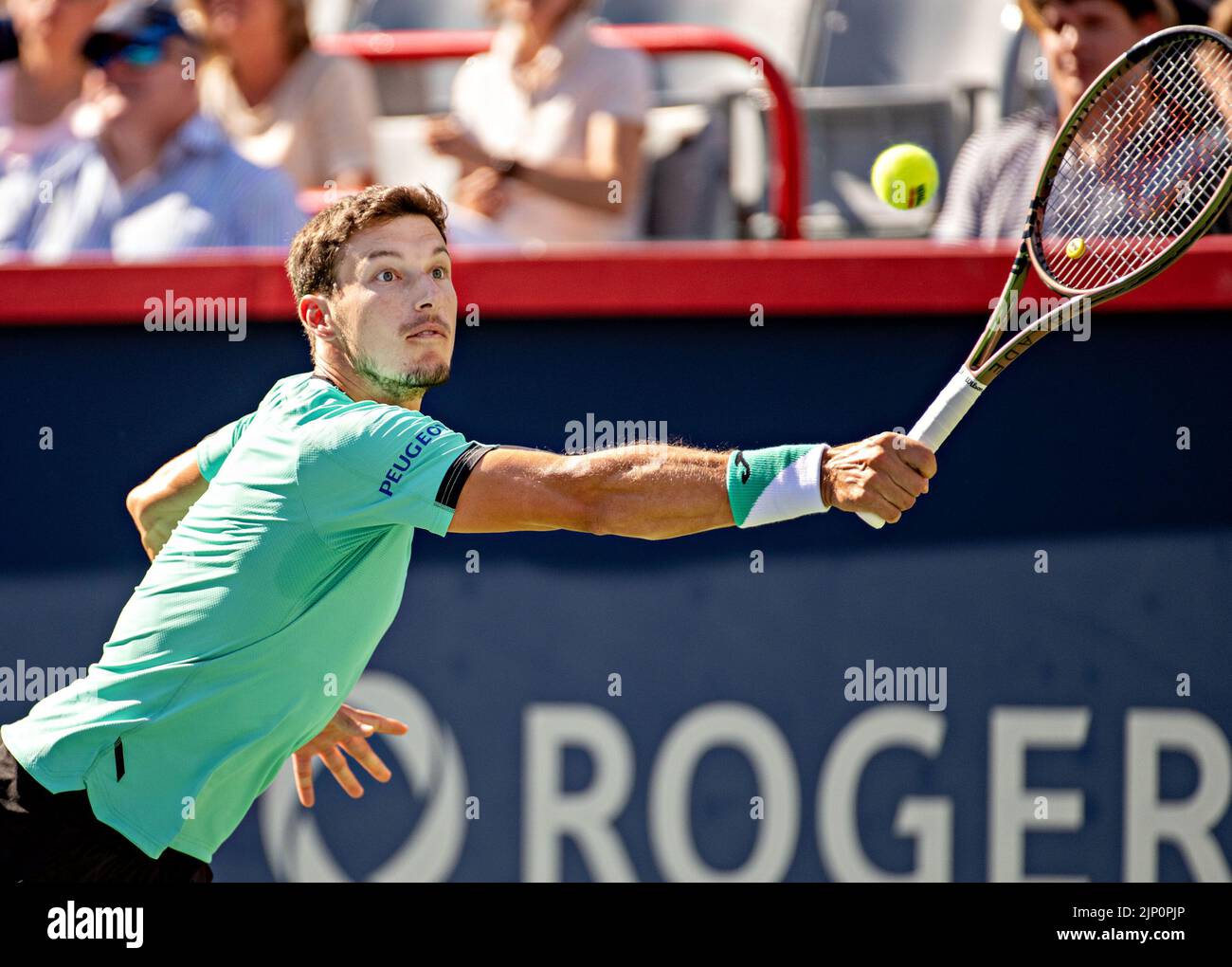 Montreal, Canada. 14th Aug, 2022. Pablo Carreno Busta of Spain returns the ball during the men's singles final against Hubert Hurkacz of Poland at the 2022 National Bank Open tennis tournament at the IGA Stadium in Montreal, Canada, Aug. 14, 2022. Credit: Andrew Soong/Xinhua/Alamy Live News Stock Photo