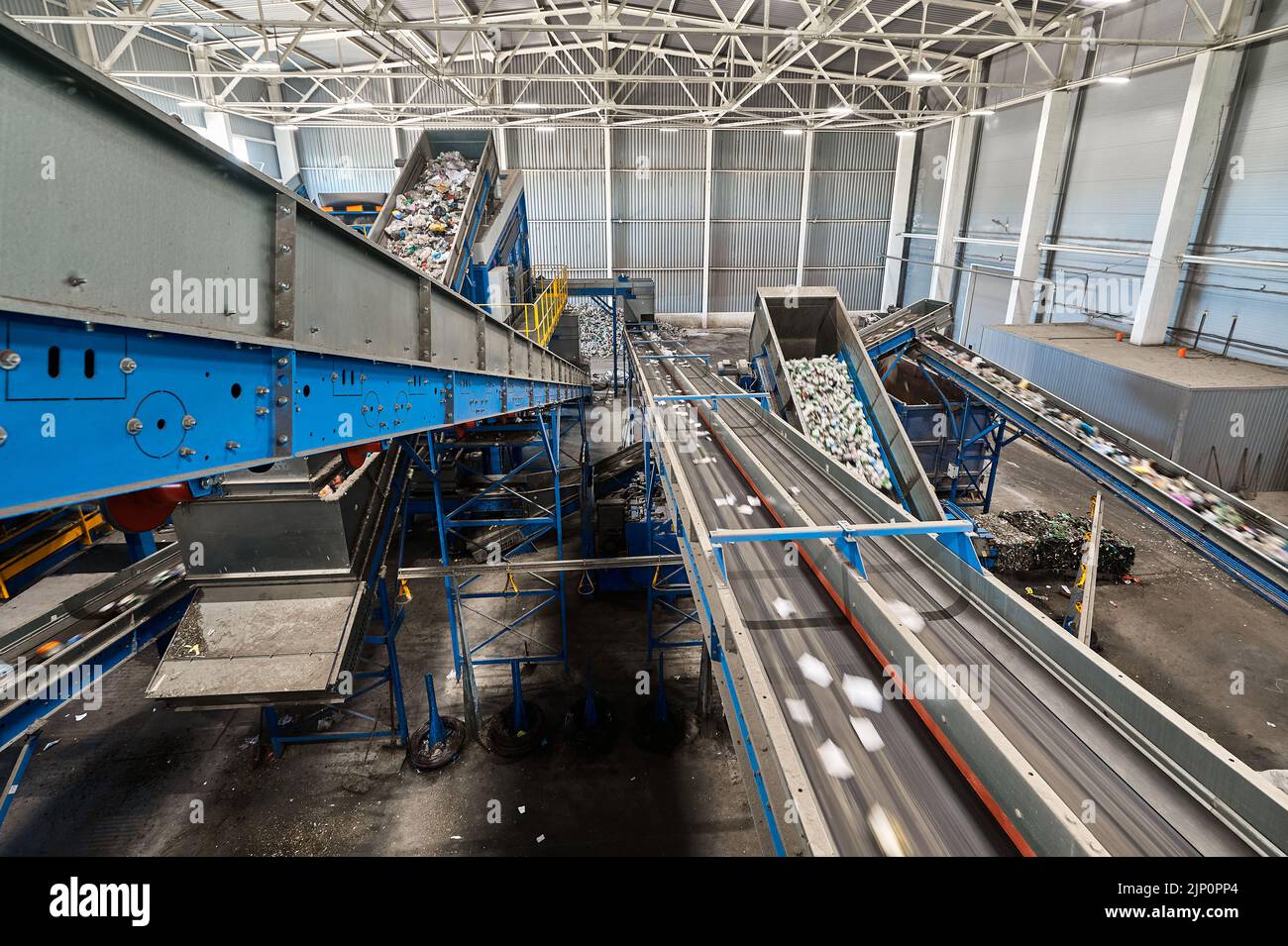 Conveyor belt transports sorted litter at recycling plant Stock Photo