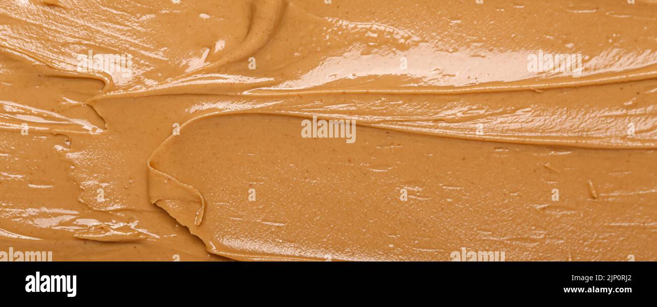 Texture of nut butter as background, closeup Stock Photo - Alamy