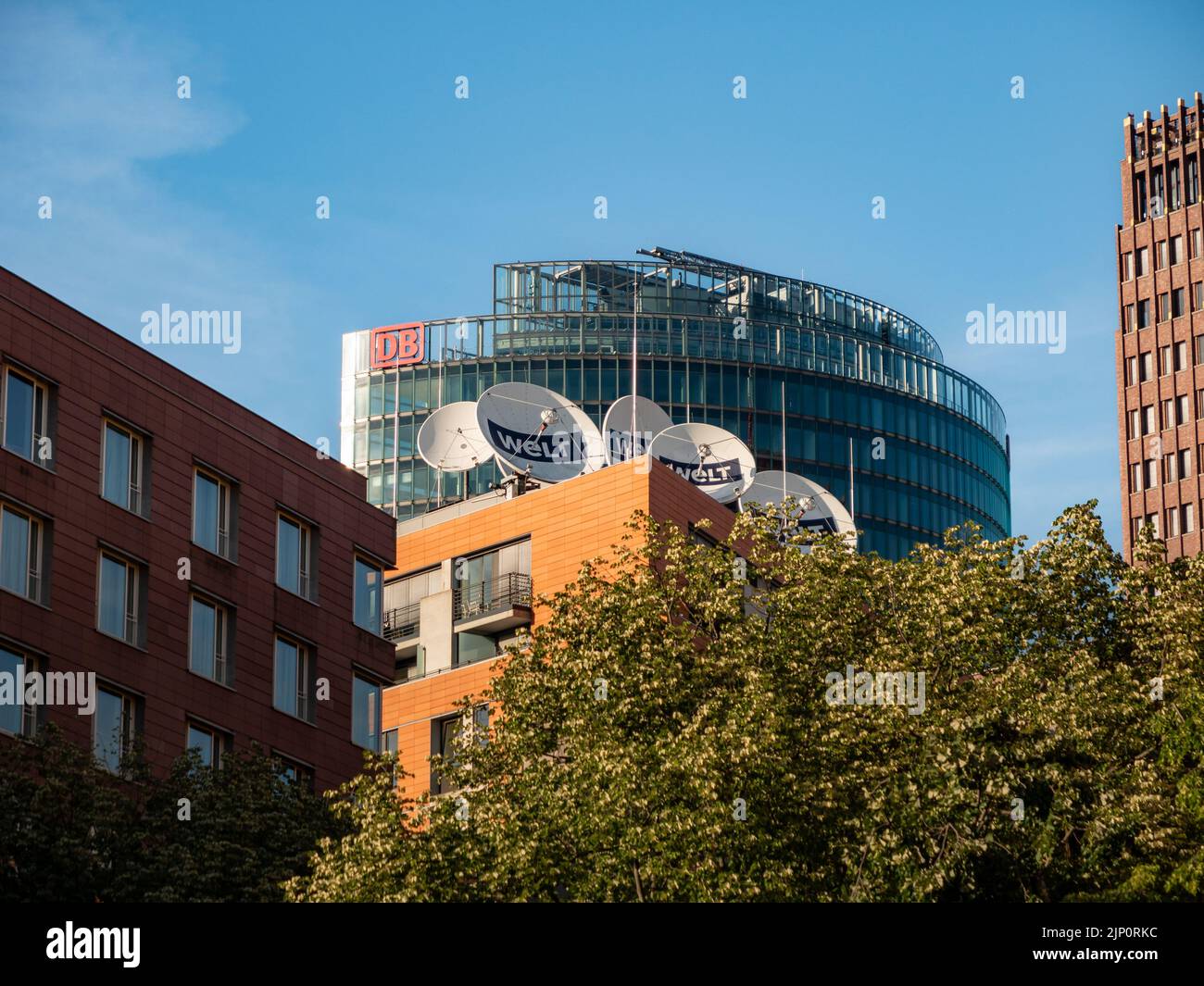 Buildings at the Potsdamer Platz from big companies. The Bahntower is visible and a lot of satellite dishes from the television news channel WELT. Stock Photo