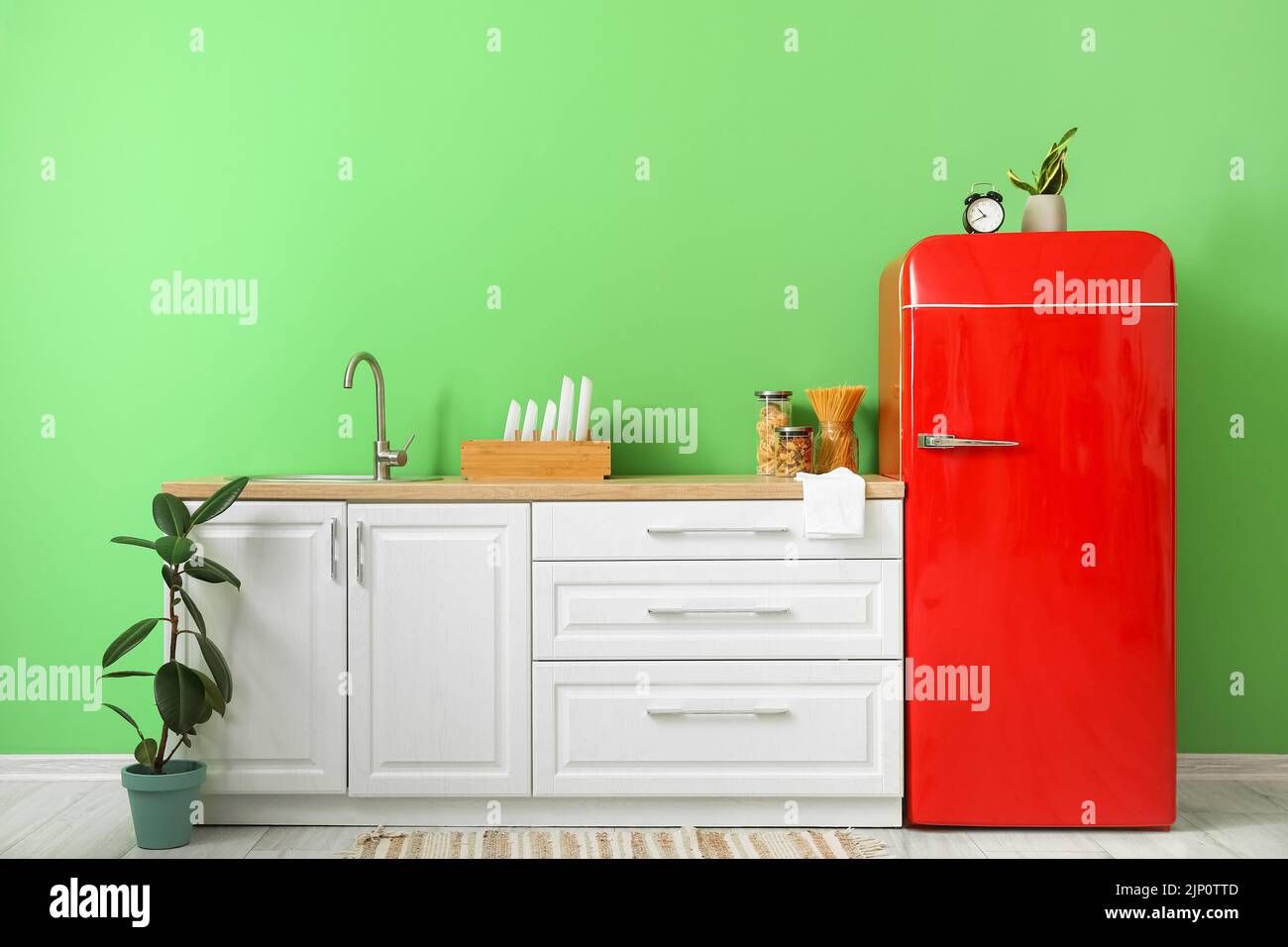 Interior of stylish kitchen with retro fridge and counters Stock Photo ...