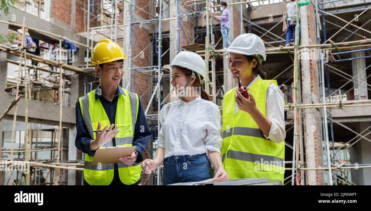 Structural Engineer At Work Structural engineer and architect discussing and working with ...