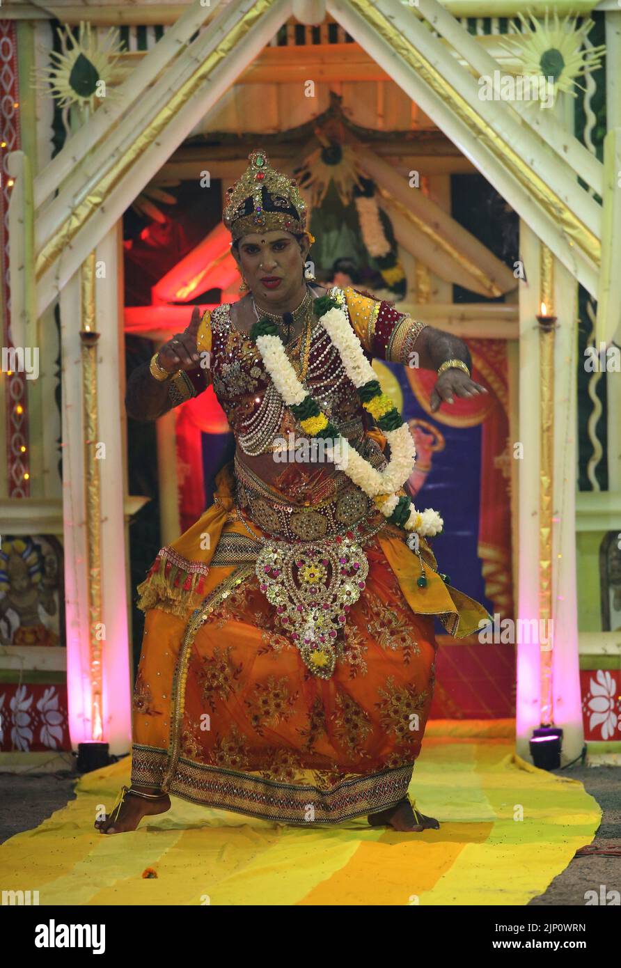 Colombo, Sri Lanka. 14th Aug, 2022. A Sri Lankan traditional dancer performs paththini Dance during the traditional ritual 'Gammaduwa' ceremony in Nawagamuwa near Colombo on August 13, 2022. Among the yatukarma held in the low country areas of Sri Lanka, the Gammaduwa Shanthikarma is a major yatukarma aimed at the prevention of diseases and fertility of the Sinhalese. Gammaduwa Shanthikarma started in the Ruwanwella area as 'Devol Maduwa' for a disease prevention craft. It has become the main Shanthikarma of the low country dance tradition consisting of the three main dance traditions of Mata Stock Photo