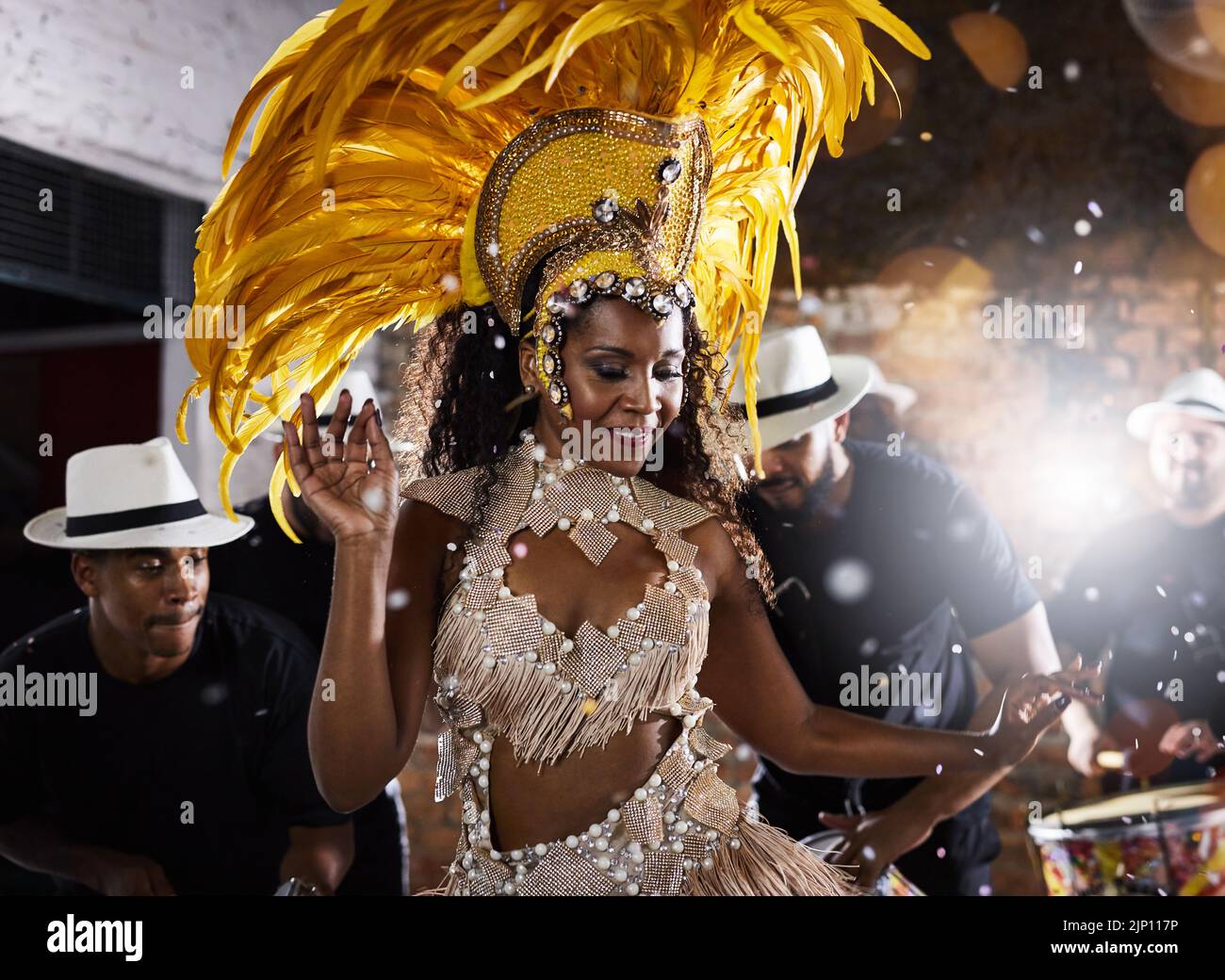 Just keep moving and grooving. samba dancers performing in a carnival ...