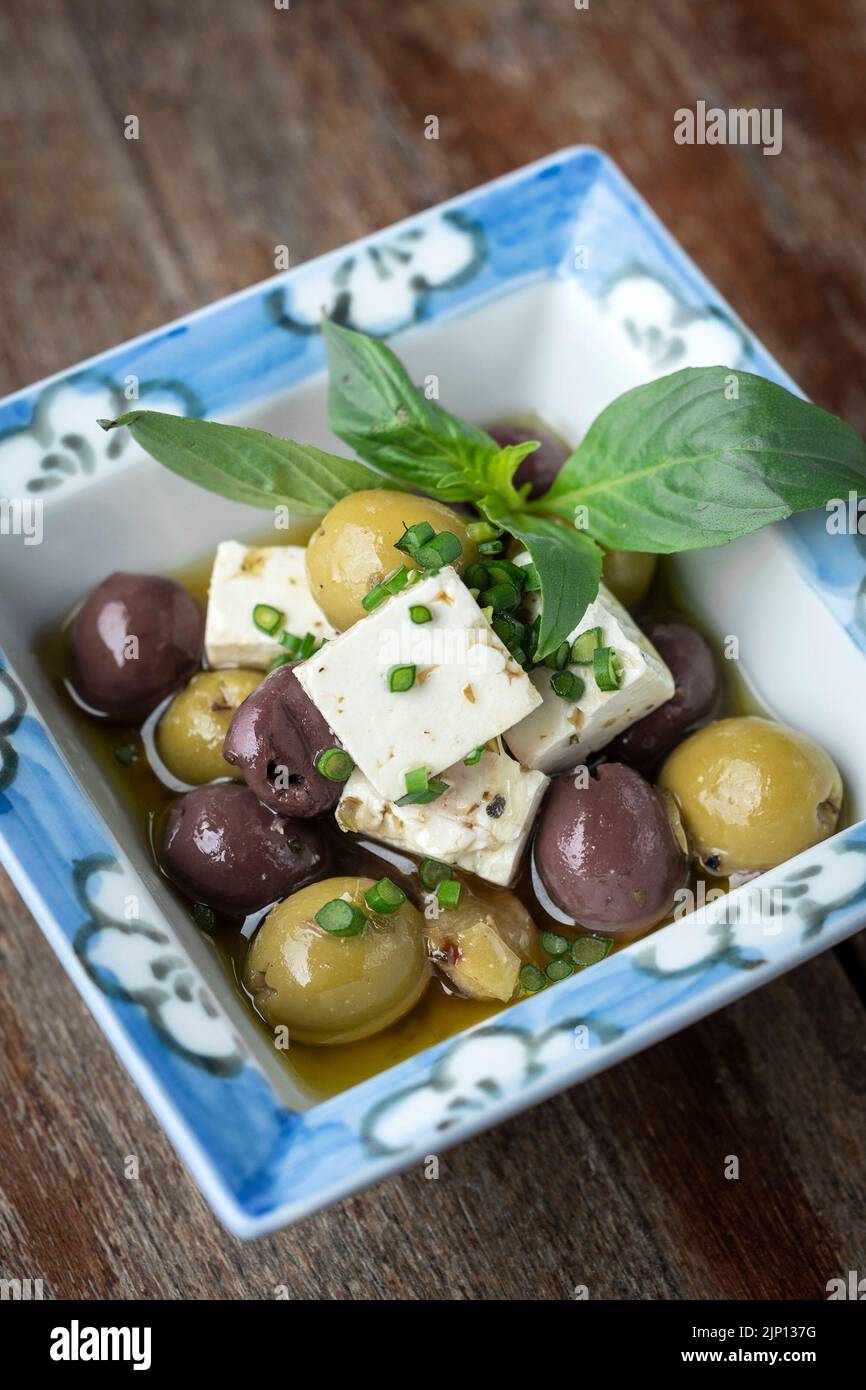 marinated spanish olives and feta cheese tapas in rustic barcelona ...