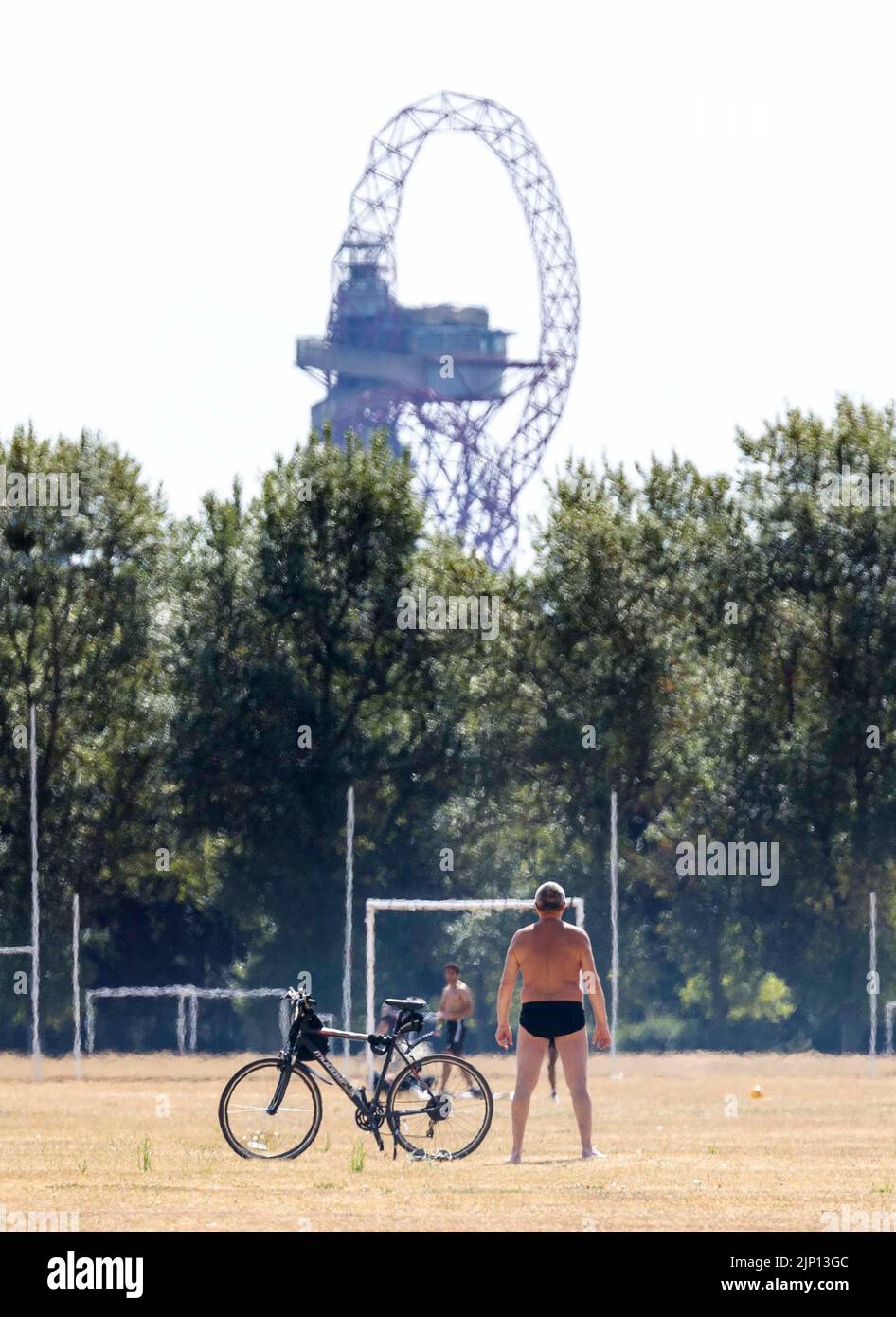 pic shows:  Sun worshipper  over Hackney Marshes today which ironically was bone dry and brown  Picture by Gavin Rodgers/ Pixel8000 Stock Photo