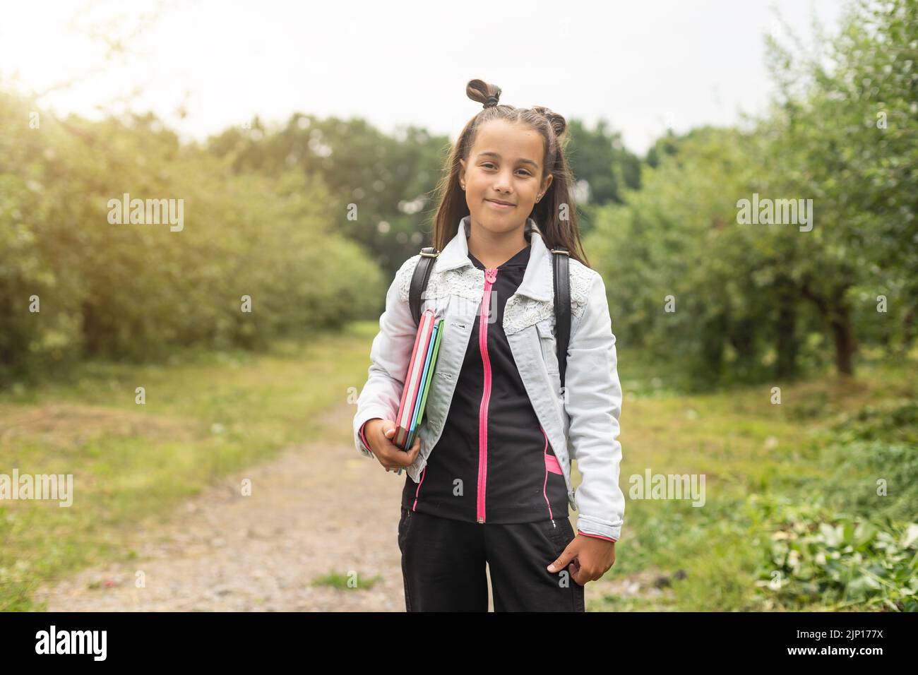 Child going back to school. Start of new school year after summer vacation. Little girl with