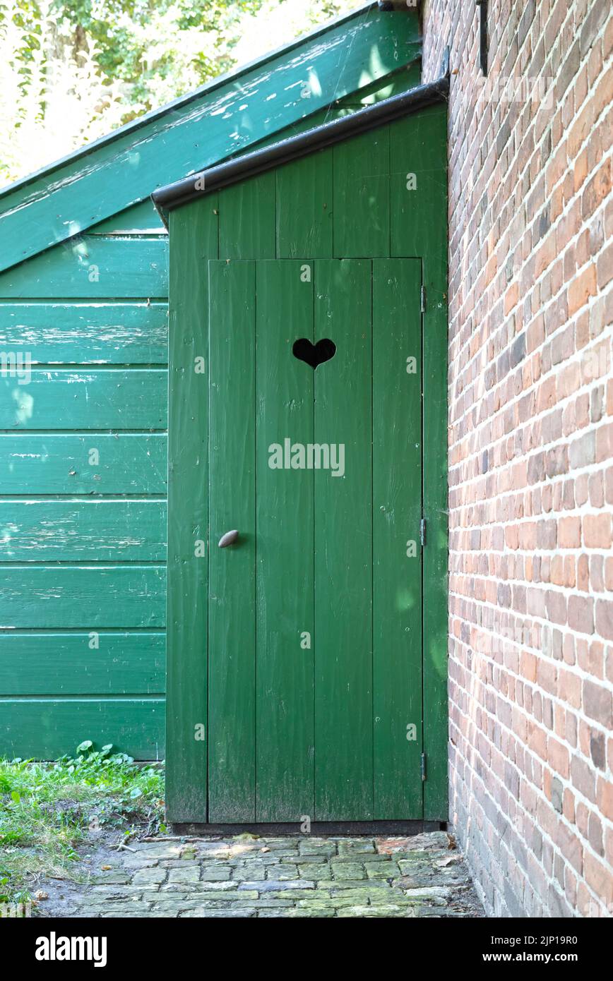 Old toilet outside in the garden, the Netherlands Stock Photo Alamy