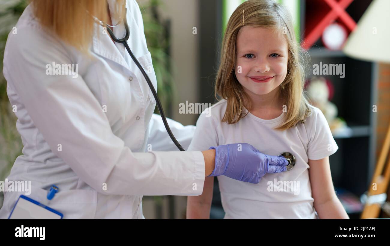 Cheerful little child at doctor pediatrician appointment Stock Photo
