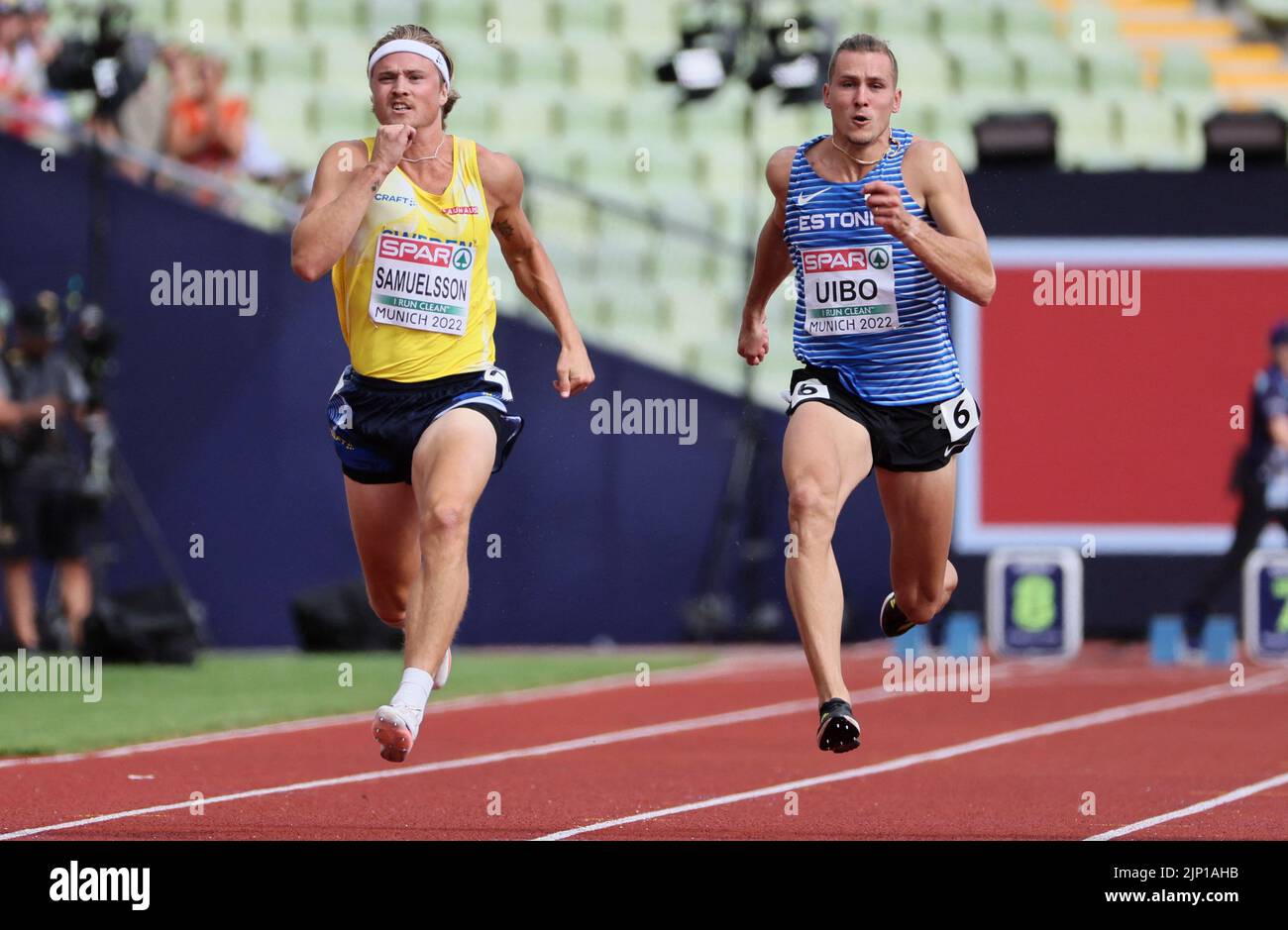 Athletics - 2022 European Championships - Olympiastadion, Munich, Germany - August 15, 2022 Sweden's Fredrik Samuelsson and Estonia's Maicel Uibo in action during the Men's Decathlon 100m - Heats REUTERS/Wolfgang Rattay Stock Photo