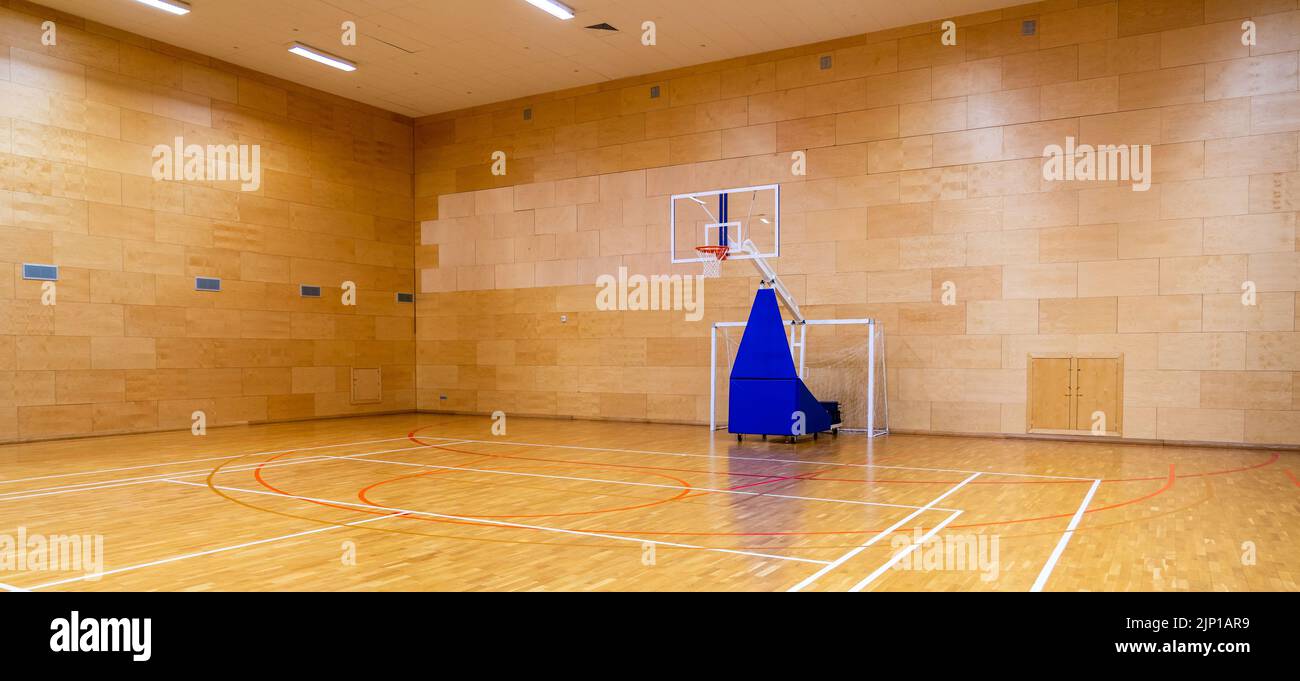 Empty sports hall for basketball, volleyball or futsal Stock Photo