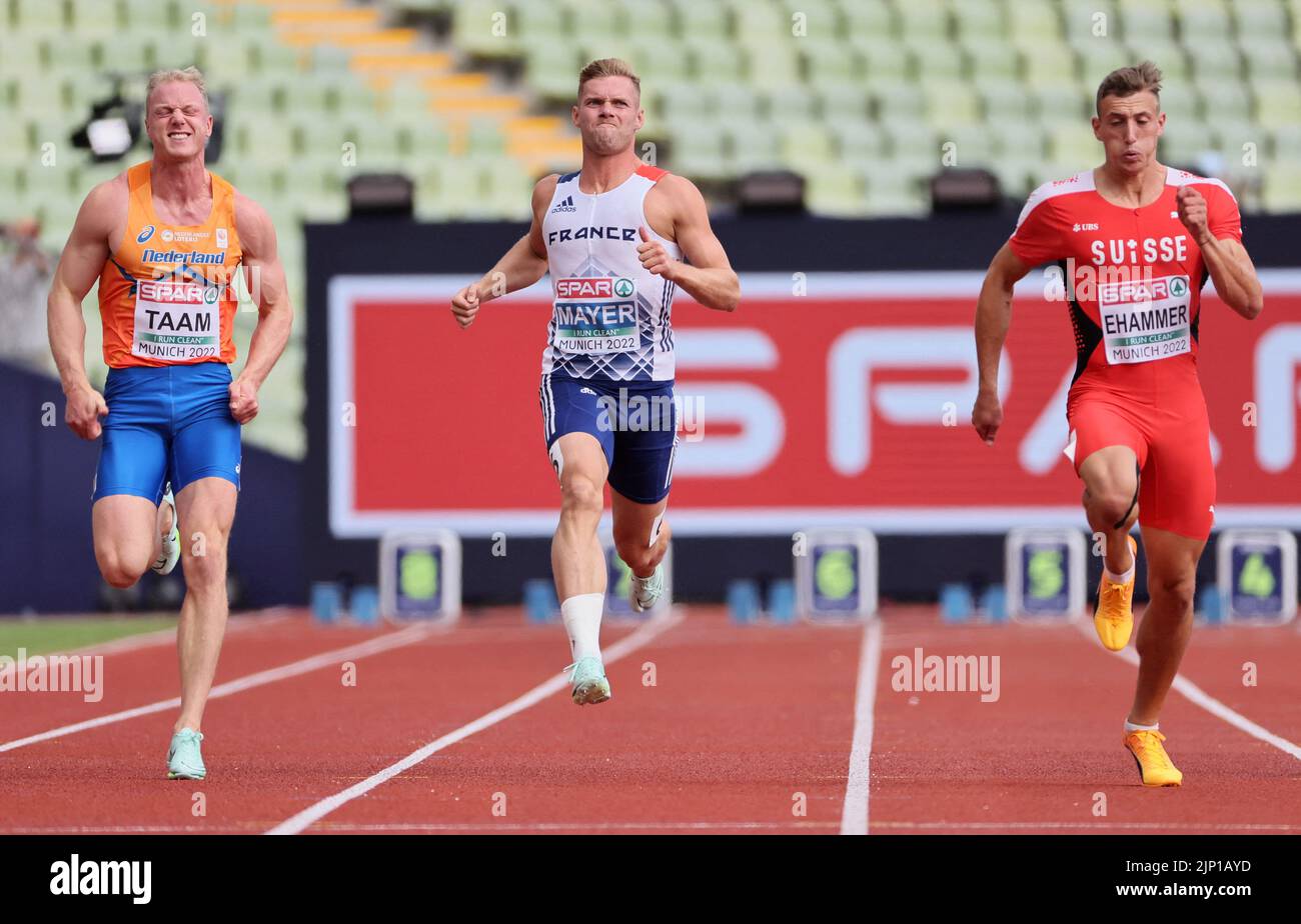 Athletics - 2022 European Championships - Olympiastadion, Munich, Germany - August 15, 2022 France's Kevin Mayer in action with athletes during the Men's Decathlon 100m - Heats REUTERS/Wolfgang Rattay Stock Photo