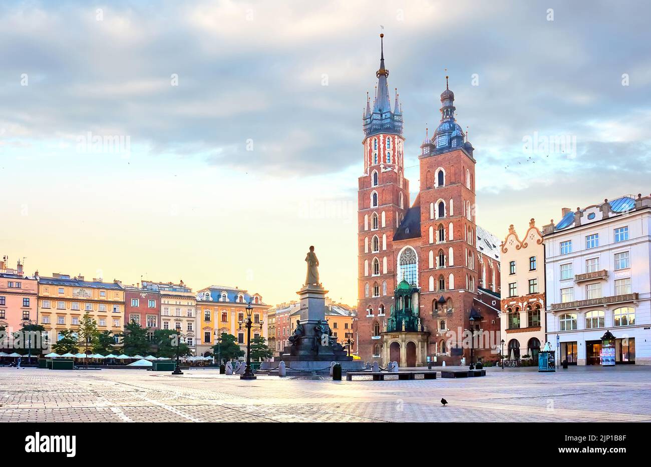 Mariacki Cathedral at Market square in Krakow at the center of old town at sunrise, Poland Stock Photo