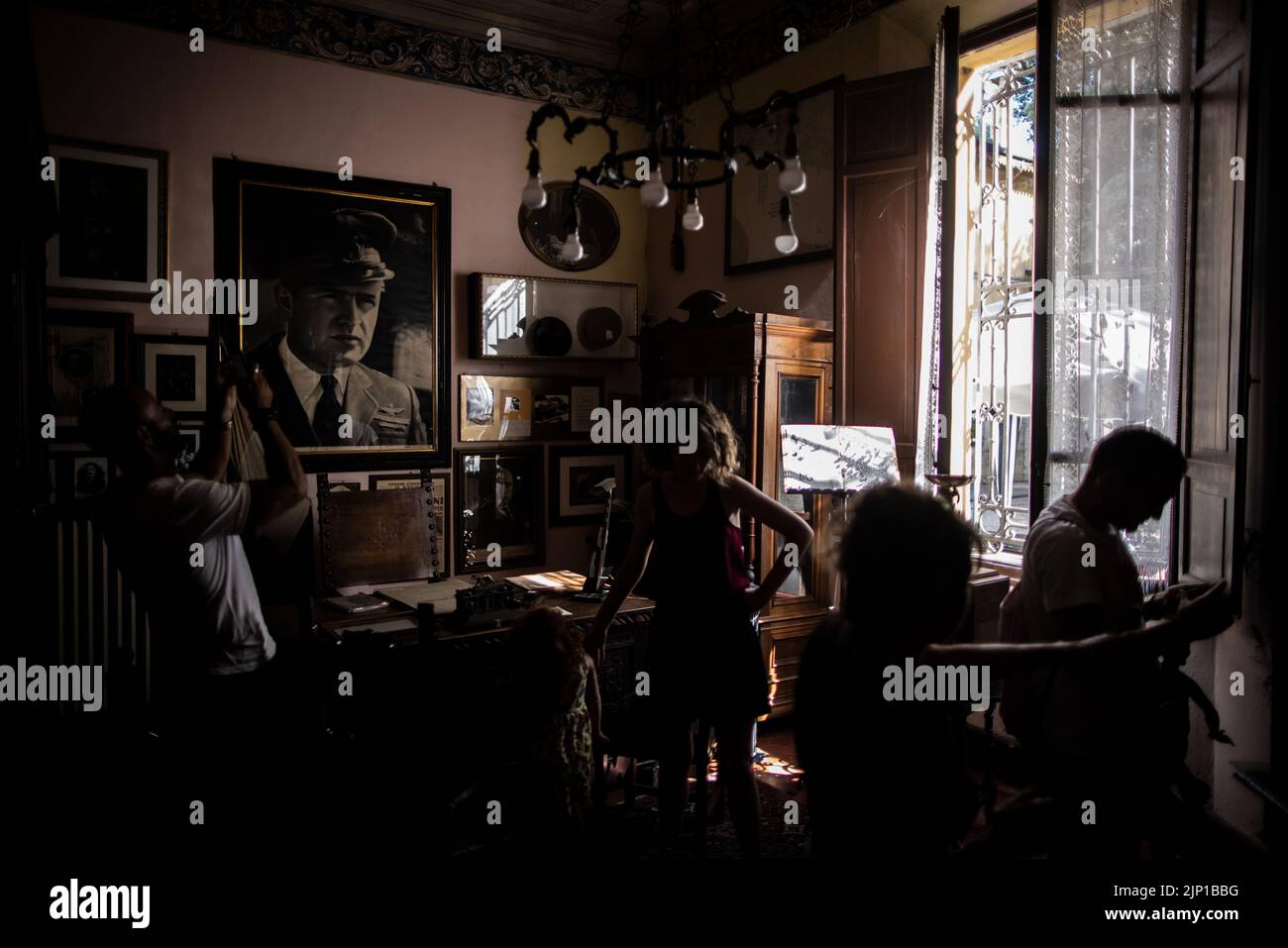 Forli, Italy. 10th Aug, 2022. Italians stand in the office of former Italian dictator Benito Mussolini, in his house in Forli, which was bought from the Mussolini family at the turn of the millennium and converted into a private museum. Italy will elect a new government on Sept. 25, 2022, with Giorgia Meloni's post-fascist 'Fratelli d'Italia' party expected to win. (to dpa 'Italy's election favorite Meloni and fascism - 'worry is real'') Credit: Oliver Weiken/dpa/Alamy Live News Stock Photo