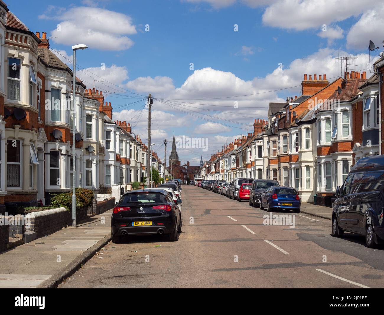 Holly Road, Northampton, UK; a residential street of typical late Victorian terraced housing. Stock Photo