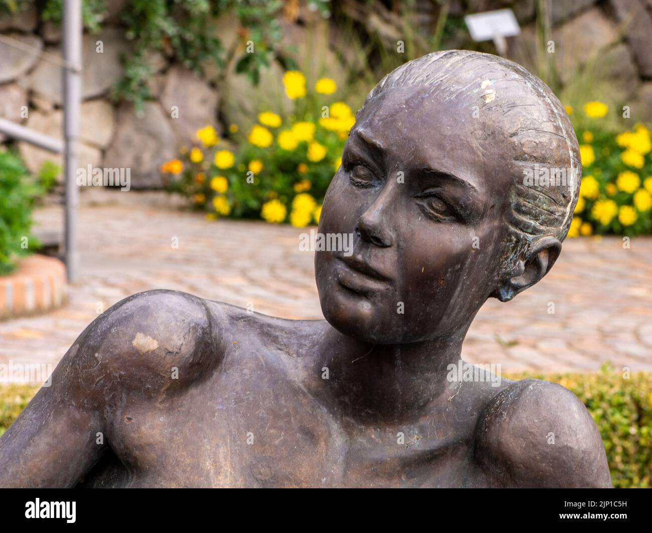 bronze sculpture of the nymph at the Trauttmansdorff gardens of Merano - South Tyrol, northern Italy Stock Photo