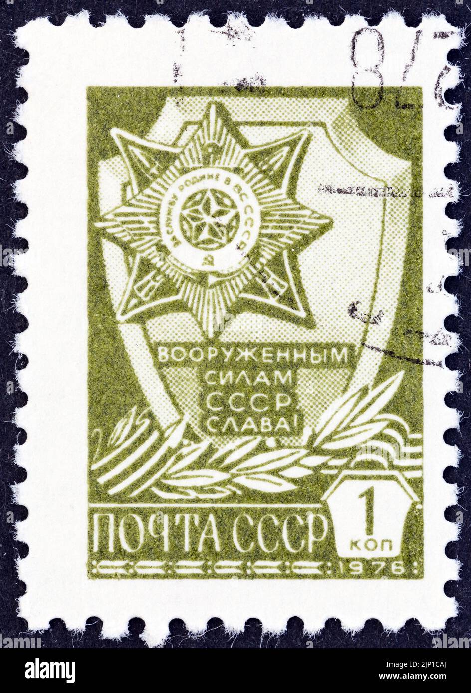 USSR - CIRCA 1976: A stamp printed in USSR shows Soviet Armed Forces Order, circa 1976. Stock Photo