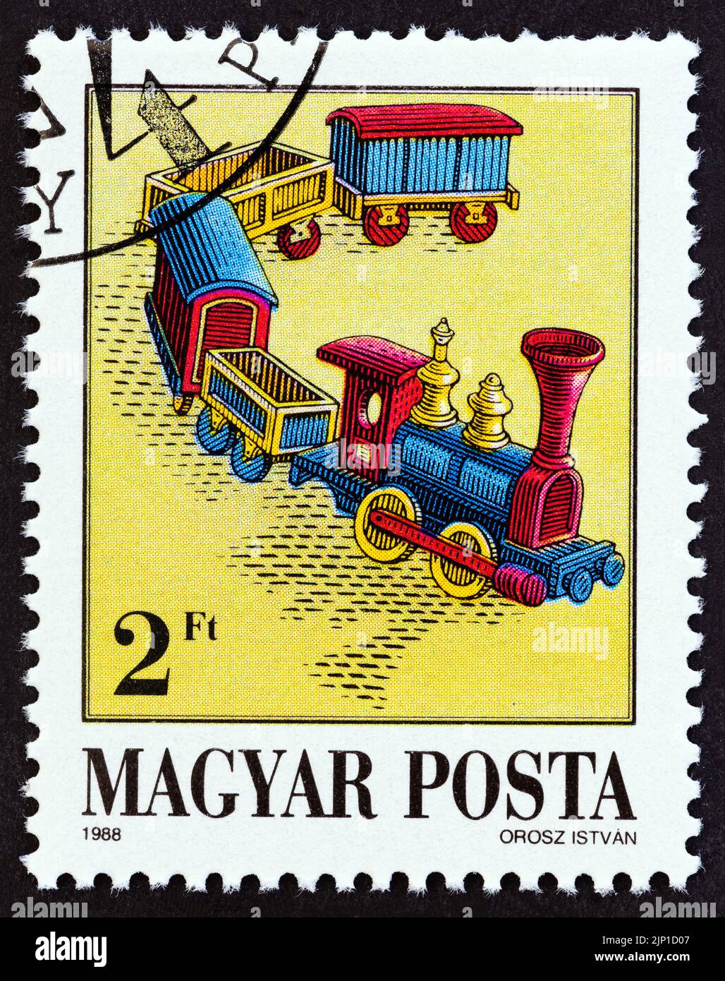 HUNGARY - CIRCA 1988: A stamp printed in Hungary from the 'Exhibits in Toy Museum, Kecskemet' issue shows Steam Train, circa 1988. Stock Photo