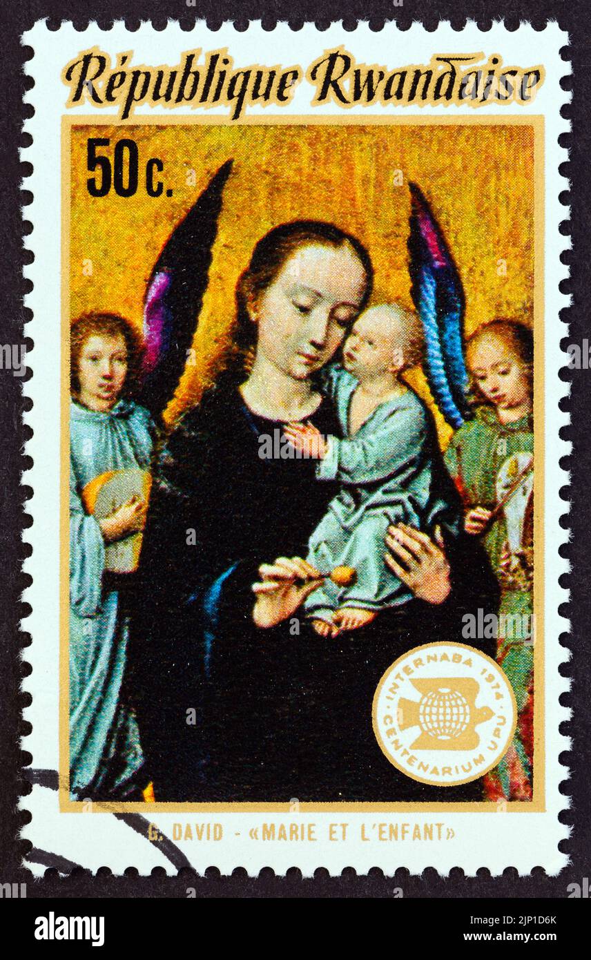 RWANDA - CIRCA 1974: A stamp printed in Rwanda from the 'International Stamp Exhibitions' issue shows Virgin Mary and Child (Gerard David), circa 1974. Stock Photo