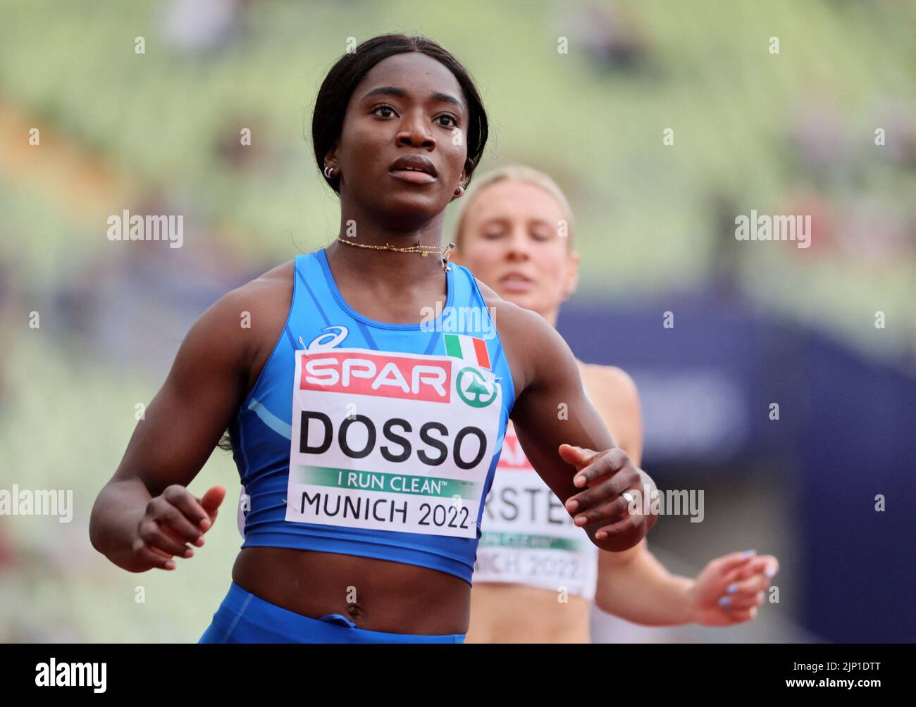 Athletics - 2022 European Championships - Olympiastadion, Munich, Germany - August 15, 2022 Italy's Zaynab Dosso reacts after she finish first during the Women's 100m Round 1 - Heats REUTERS/Wolfgang Rattay Stock Photo