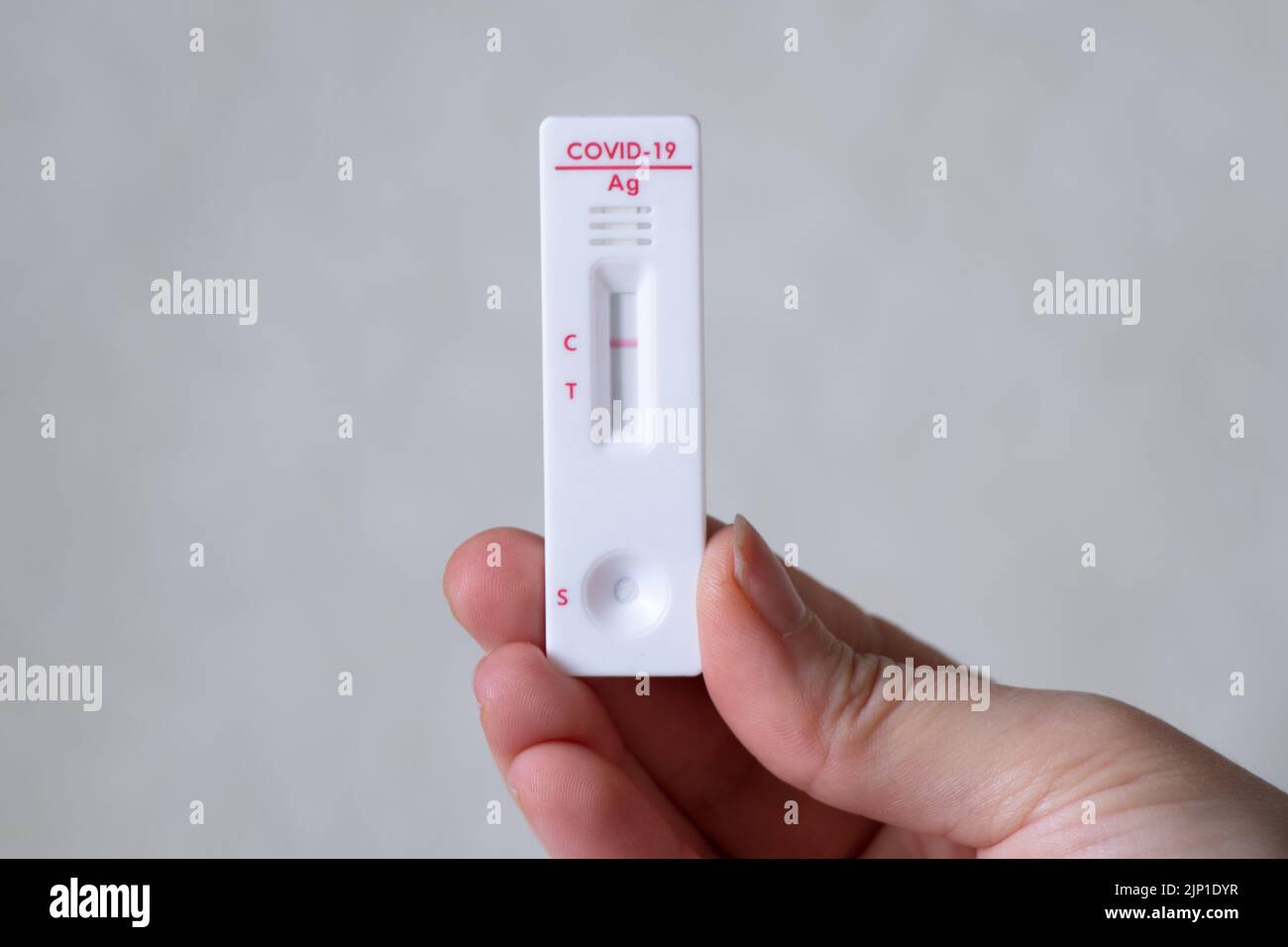 Negative covid test in doctor's hands, antibody test Stock Photo