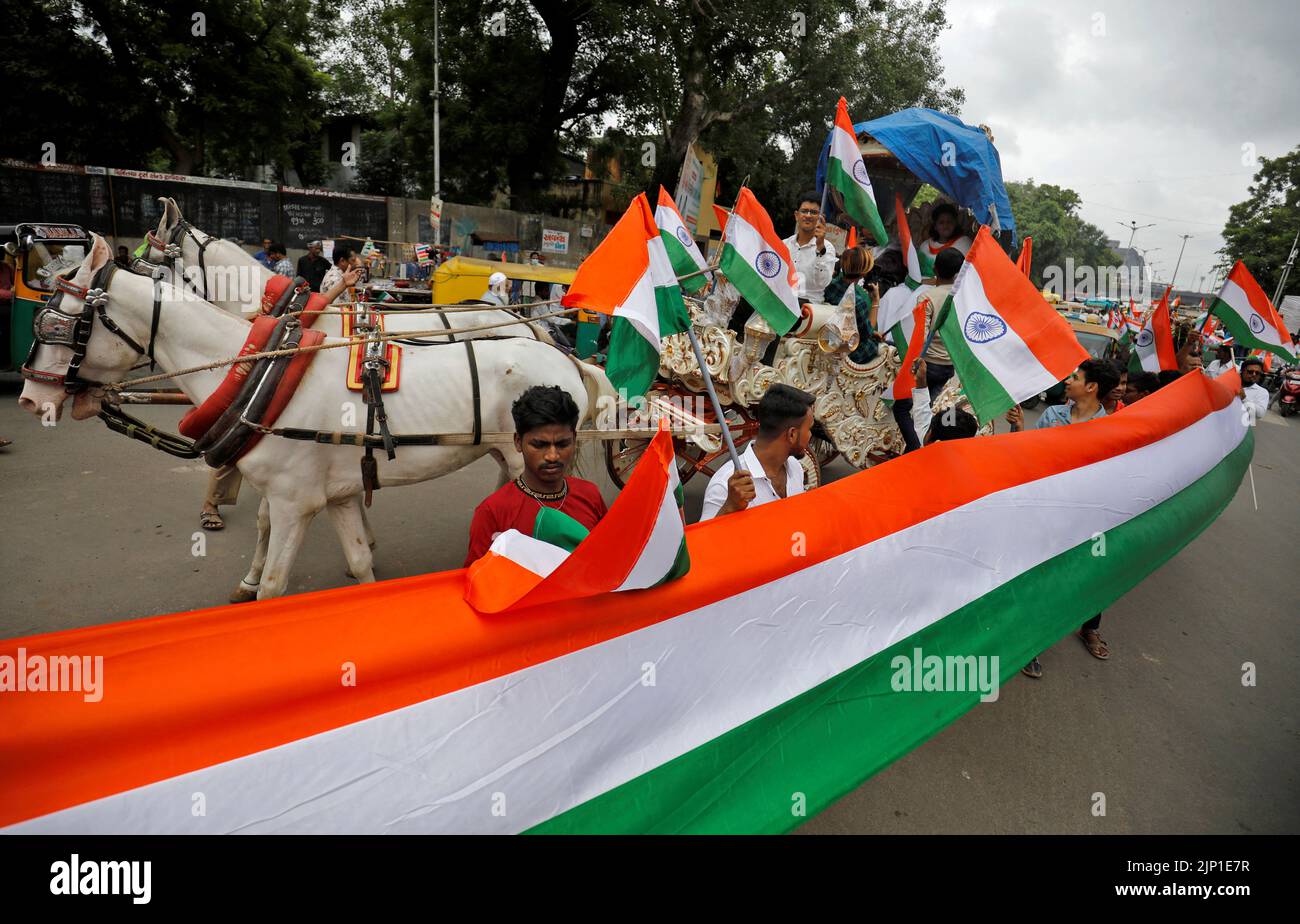 Police hold national flags as they take part in India's Independence Day celebrations in Ahmedabad, India, August 15, 2022. REUTERS/Amit Dave Stock Photo